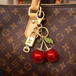 Authentic Louis Vuitton Lock & Key with unbranded Cherry Charm, Keycharm 031326